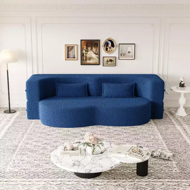 Divano componibile trasformabile moderno Okak, divano a pavimento con 2 cuscini, divano rivestito in tessuto Teddy, materasso pieghevole, nessun assemblaggio richiesto