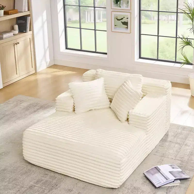Divano letto con chaise longue moderno e comodo Okak con cuscini, divano futon imbottito in velluto a coste con seduta profonda per soggiorno