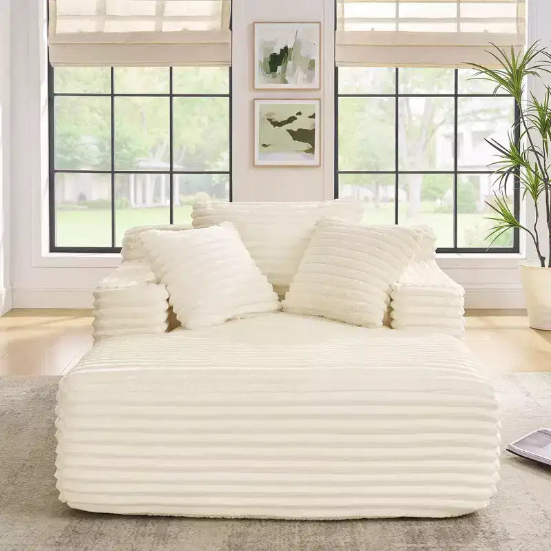 Divano letto con chaise longue moderno e comodo Okak con cuscini, divano futon imbottito in velluto a coste con seduta profonda per soggiorno