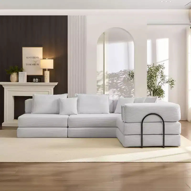 Divano modulare a L Whisen 118.2 con 6 cuscini, combinazione fai da te oversize imbottita