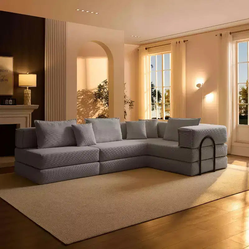 Divano modulare a L Whisen 118.2 con 6 cuscini, combinazione fai da te oversize imbottita
