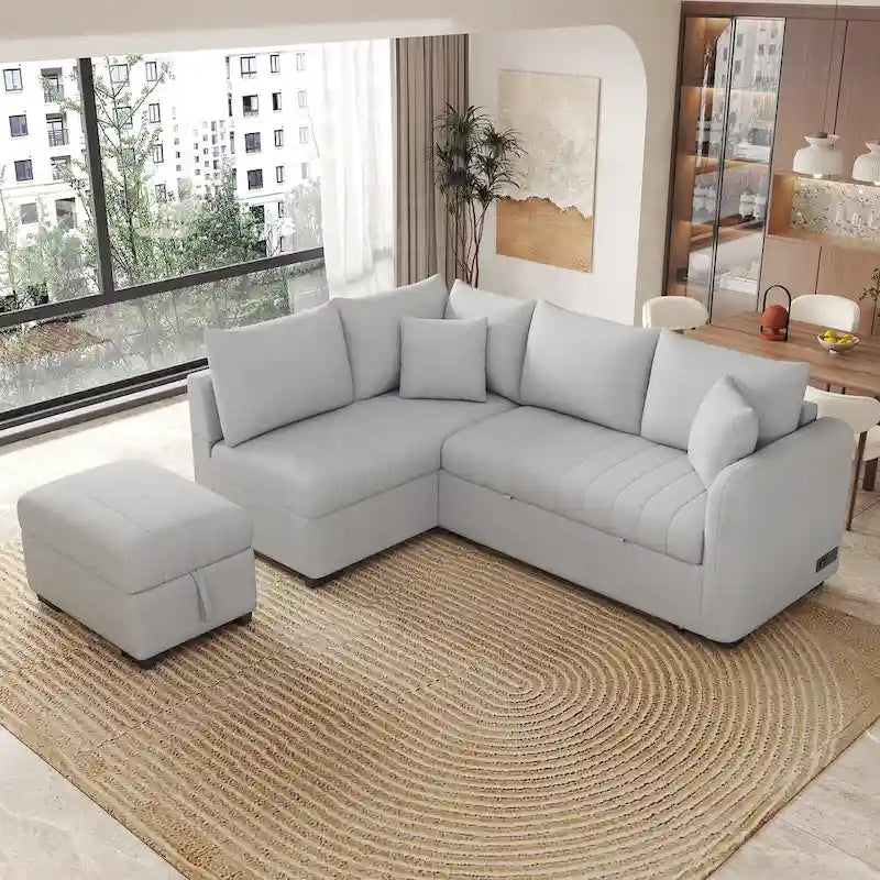 Divano letto estraibile a L con porte USB, prese di corrente e pouf contenitore