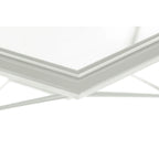 Tavolino moderno ottagonale in vetro con base geometrica in metallo