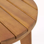 Tavolino laterale circolare da esterno GDFStudio Parker con ripiano a doghe in legno di acacia, Teak